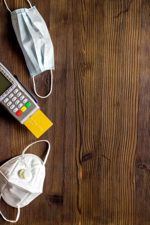 Payment terminal with face masks. Payment for hospital and medical servicesの写真素材