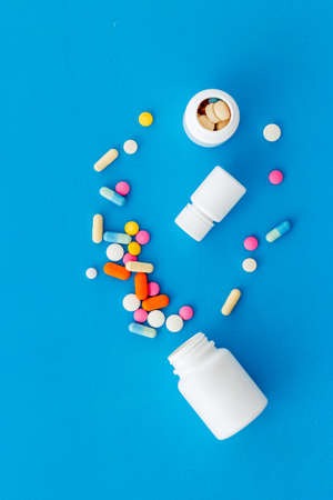 Pills bottle with medicines and vitamins, view from aboveの写真素材