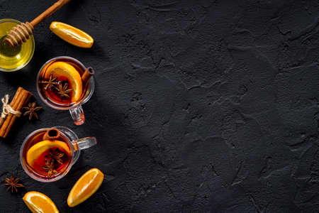 Christmas mulled red wine - hot drink with spices and fruitsの写真素材
