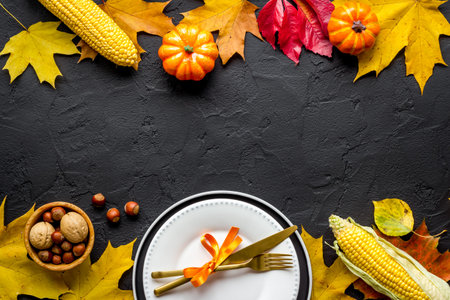 Thanksgiving holidays concept with dishes and pumpkins, top view