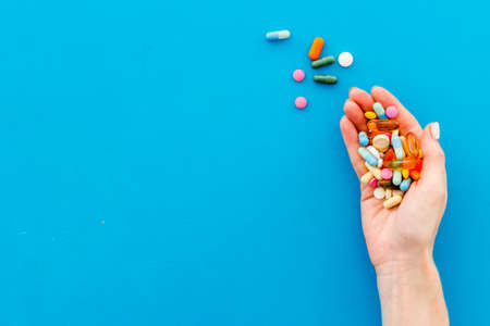 Heap of pills in hands from aboveの写真素材