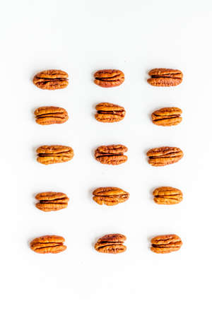 Pecan nuts pattern. Food background, top viewの写真素材