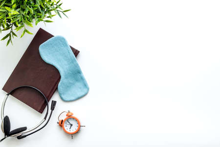 Keeping a diary and day plan on workplace before going to bed, top viewの写真素材