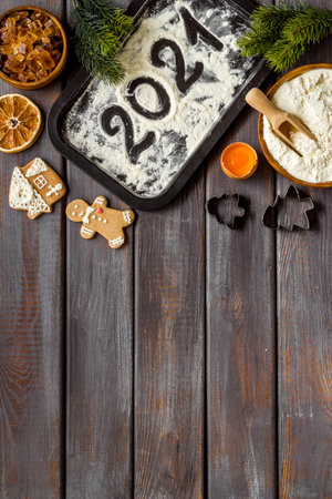 Christmas cooking background with gingerbread cookies, overhead view, flat lay