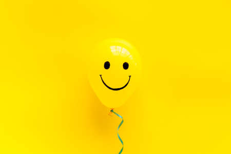 Happiness. Positive emotions painted on colored ballons. Top viewの写真素材