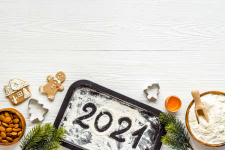 Christmas cooking background with gingerbread cookies, overhead view, flat layの写真素材