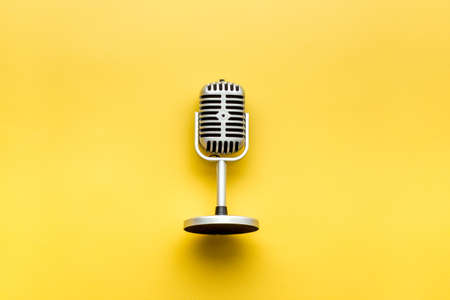 Retro style microphone. Aydio recording background. Top viewの写真素材