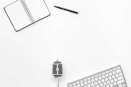 Studio microphone with keyboard on working place, top viewの写真素材