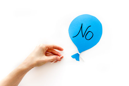 No rejection - decision concept. Word No on paper banner, top view