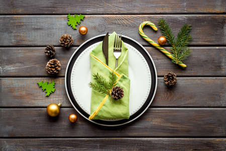 Festive place setting for Christmas dinner with decoration, top viewの写真素材