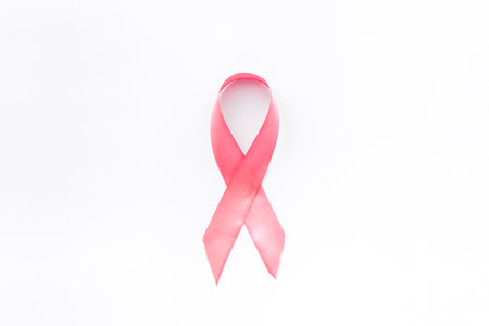 Pink ribbon breast cancer awareness isolated on white. Top viewの写真素材