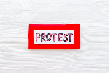 Protest sign concept. Word Protest on paper banner, top viewの写真素材