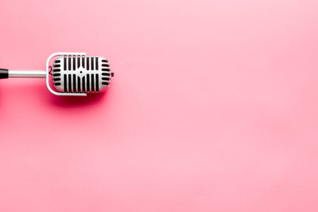 Flat lay of retro classic microphone with space for textの写真素材