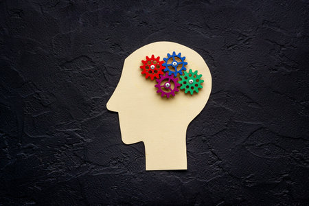 Brain model of gears and cogs on the paper head, top viewの写真素材