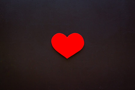 Love concept. Heart made of red paper, top viewの写真素材