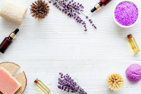 Frame of lavender cosmetics products with natural essential oil and herbs saltの写真素材