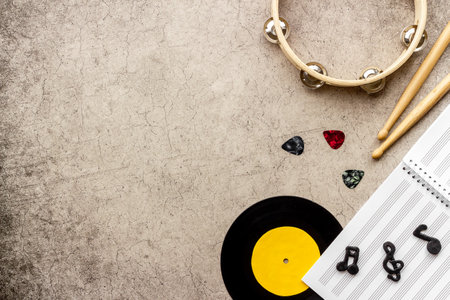 Flat lay of music background - instrument with sheet music, top viewの写真素材
