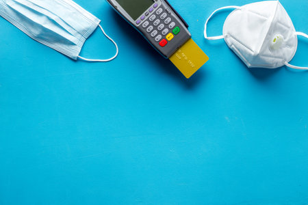 Payment terminal with face masks. Payment for hospital and medical servicesの写真素材