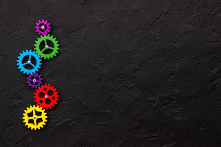 Teamwork concept. Gears connect in working mechanism, overhead viewの写真素材