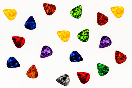 Guitar picks pattern. top view. Music background