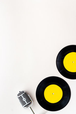 Vinyl record with microphone, music flat design backgroundの写真素材