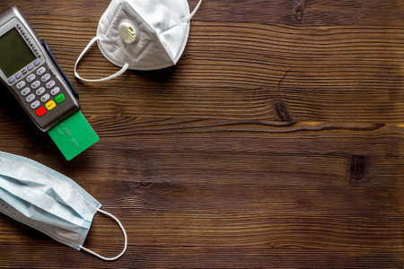 Payment terminal with face masks. Payment for hospital and medical servicesの写真素材