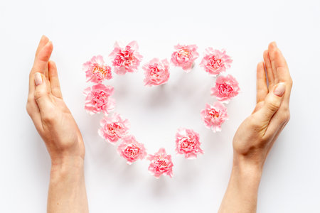 Heart of flowers - Valentines Day background, top viewの写真素材