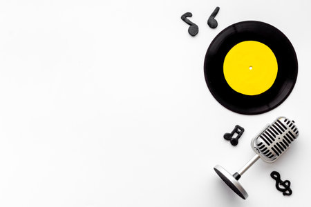 Vinyl record with microphone, music flat design backgroundの写真素材
