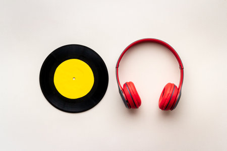 Vinyl record with headphones, music flat design backgroundの写真素材