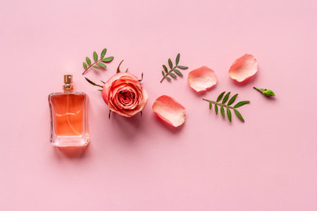 Perfume luxury bottle fragrances with roses. Top view