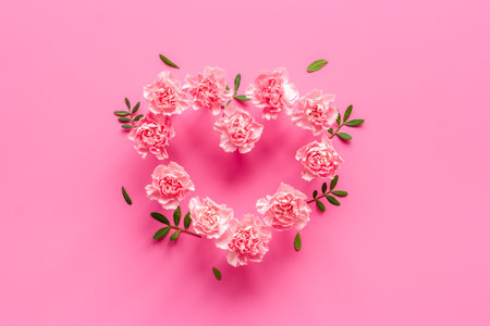 Valentines Day heart of pink flowers, top viewの写真素材