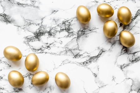 Golden eggs. Easter decoration background. Top viewの写真素材