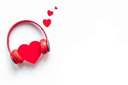 Listen to your heart. Headphones with heart of wooden, top viewの写真素材
