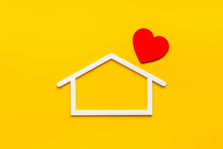 House shape with heart. Love family conceptの写真素材