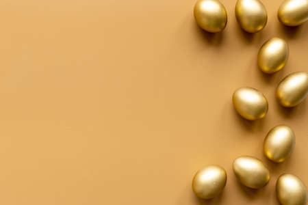 Golden eggs. Easter decoration background. Top viewの写真素材
