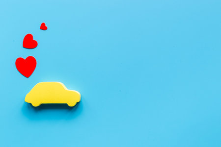 Valentines day celebration with car and heart shapes