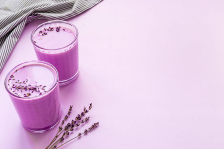 Purple lavender latte tea or coffee. Hot healthy drinkの写真素材