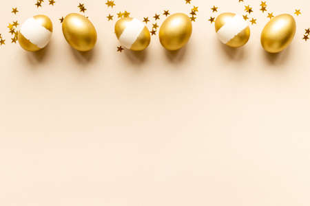 Golden Easter eggs with decoration. Wealth and good luck concept.の写真素材