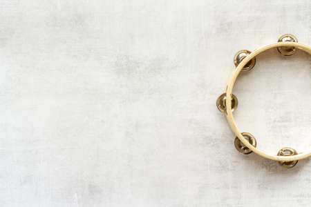 Percussion instrument tambourine, top view. Music backgroundの写真素材