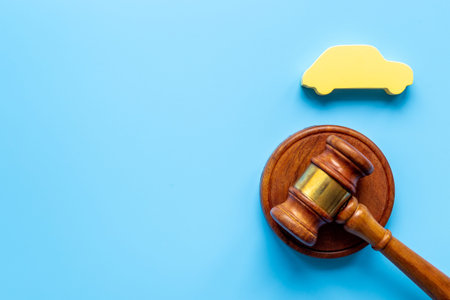 Car shape with judge gavel. Driving and insurance law conceptの写真素材