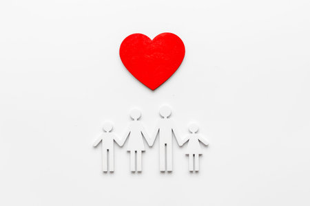 Family wooden figure and heart shape. Life insurance conceptの写真素材