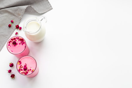 Pink rose and beetroot latte coffee or tea with milk, top viewの写真素材