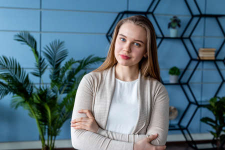 Portrait of blonde young woman at the officeの写真素材