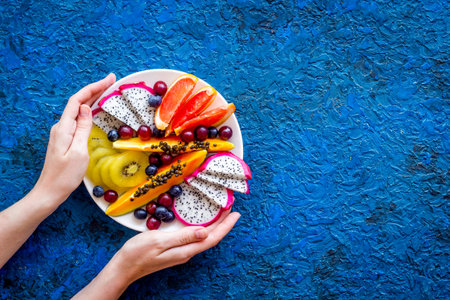 Mixed tropical exotic fruit in white dish