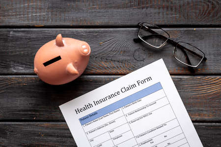Life and health insurance concept. Health insuranse claim form, top viewの写真素材