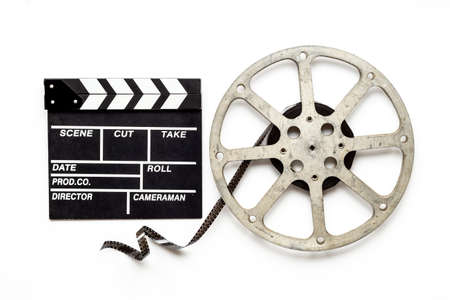 Movie film reel with clapperboard. Cinema conceptの写真素材