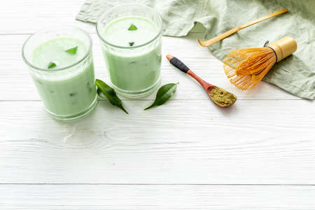 Green matcha latte tea or coffee with milkの写真素材