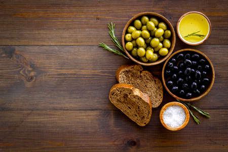 Italian food with olives bread and olive oil. Overhead viewの写真素材