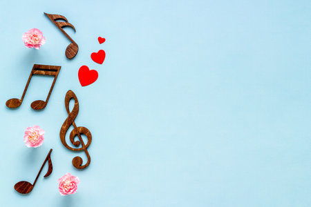 Love songs. Valentines day music with notes and flowersの写真素材