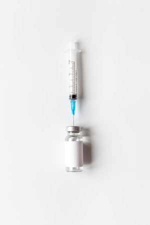 Vaccine in vial bottle with syringe. Vaccination conceptの写真素材